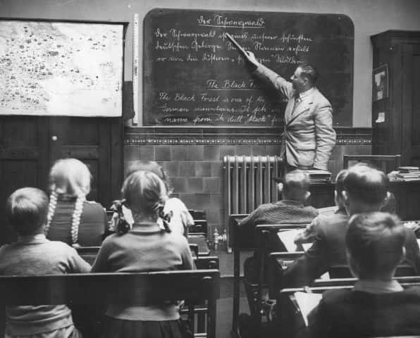 Students being taught in a classroom. Source: William Vanderson/Fox Photos/Getty Images